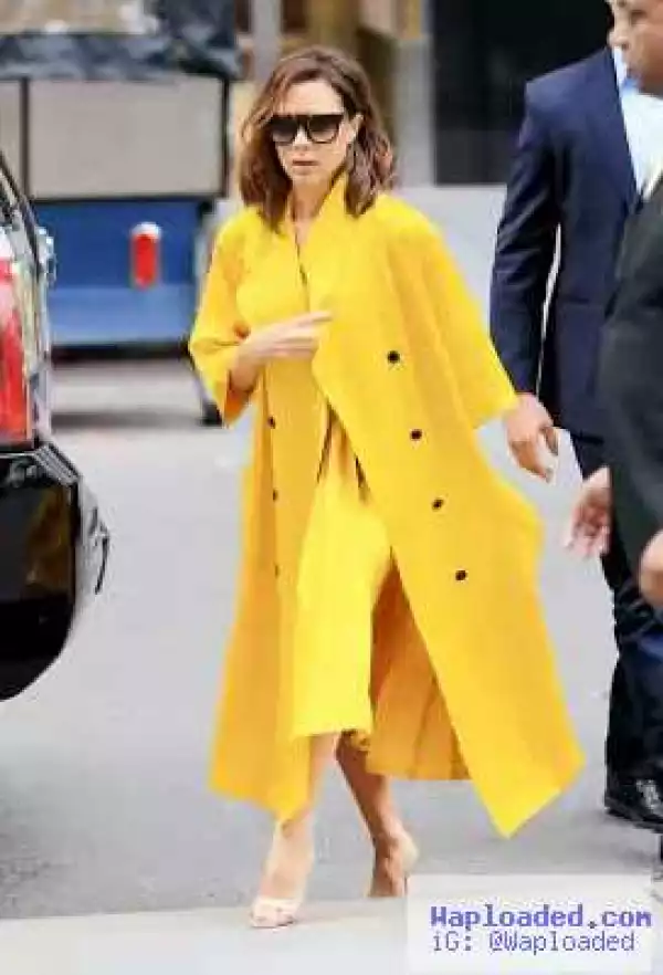 Victoria Beckham Shines In Bright Yellow Outfit
